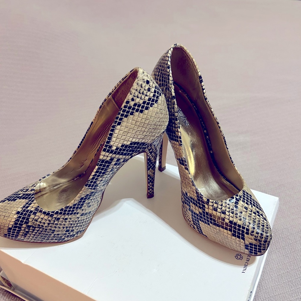 Slightly used animal print platform stilettos